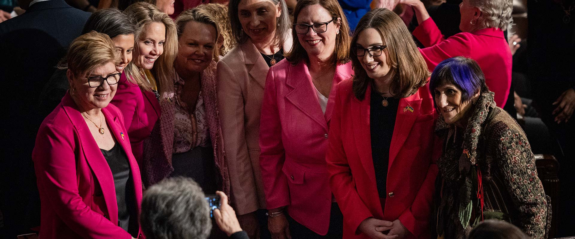 Congresswoman Pou posing for photo with her caucus